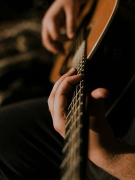 person-playing-guitar.jpg person playing guitar